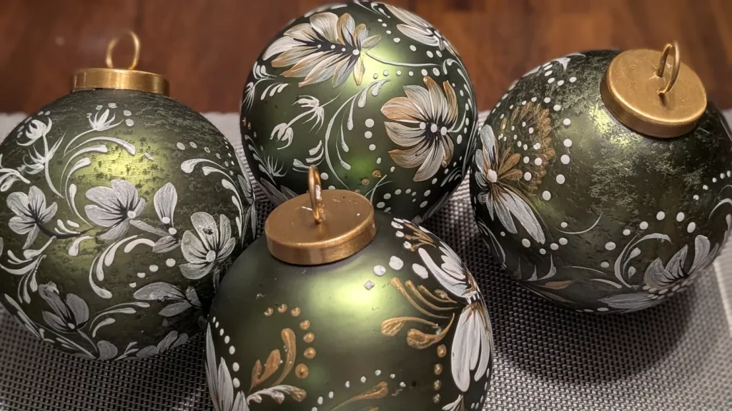 Collection of green ornaments with white florals